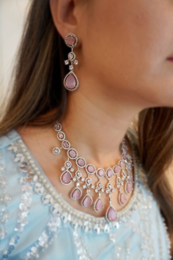 Pink stone american diamond set