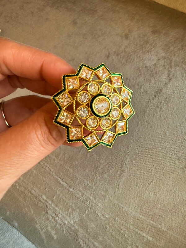 Cut golden green ring